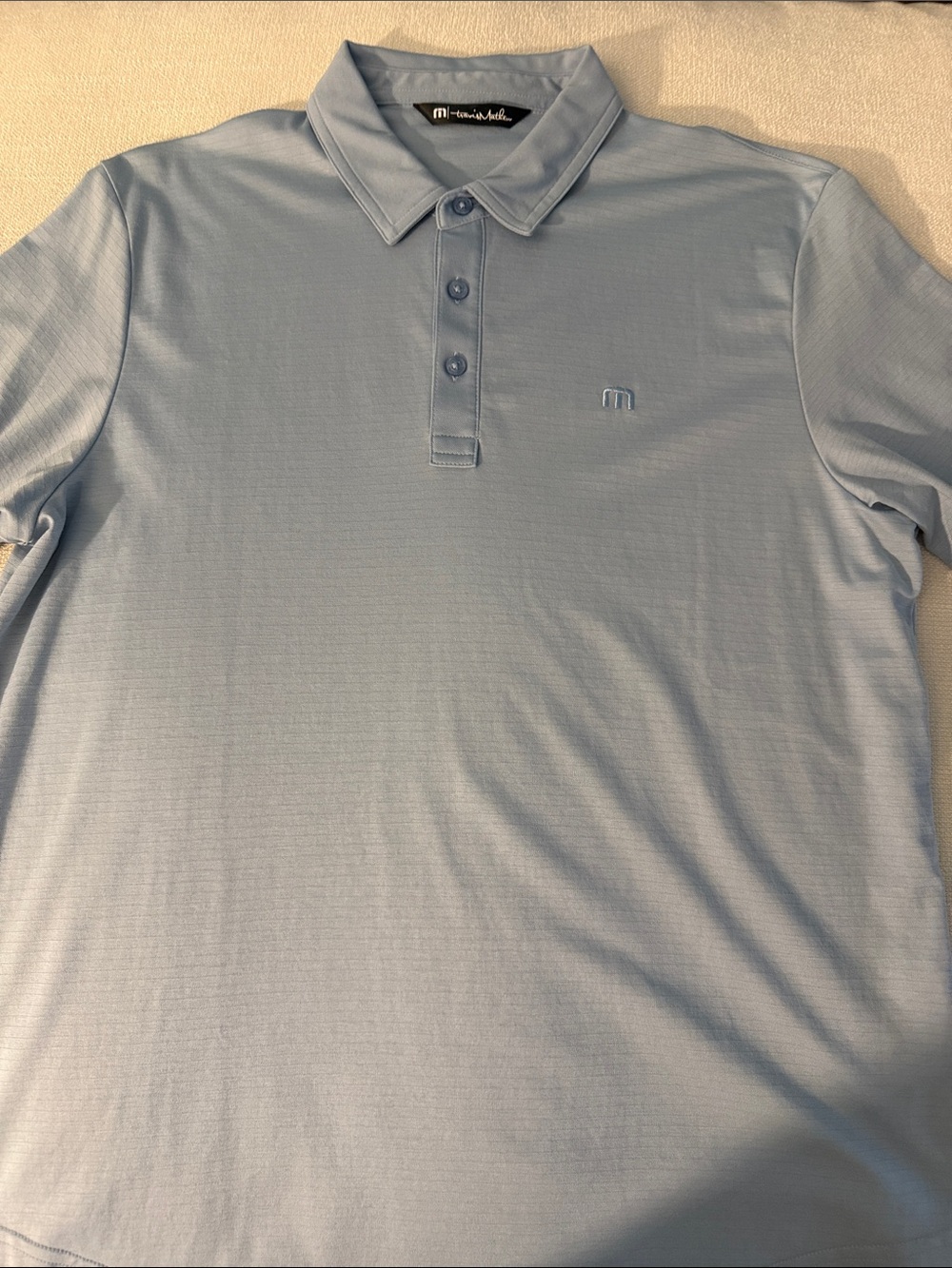 NWOT Travis Mathew Men’s Pale Blue Performance Polo